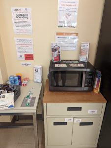 Microwave and food cupboard